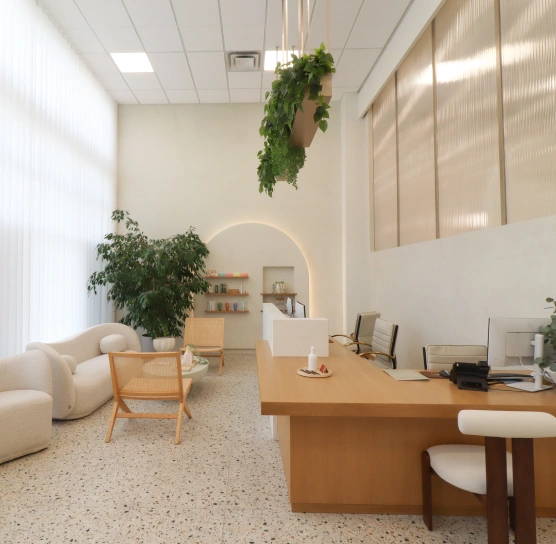 Modern, welcoming reception area at Ro Dental Group in Calgary, Alberta, designed to provide a calm and comfortable dental experience.
