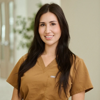 Portrait of Allie, Registered Dental Hygienist and Oral Care Pro at Ro Dental Group in Calgary, AB.